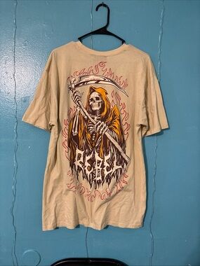 rebels Beige Short Sleeve Tee with Grim Reaper and Orange Hood Graphic